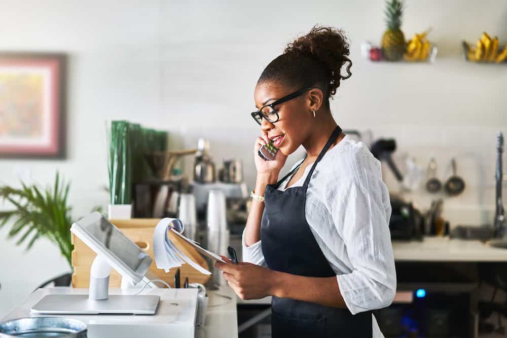 Cafe employee on the phone