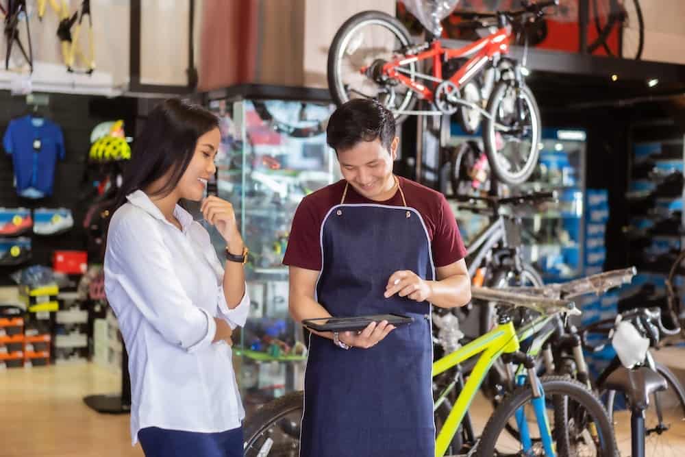 Bike store salesman placing an order