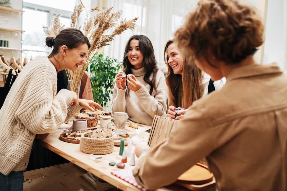 Female customers testing beauty products