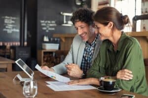 Cafe owners review key business metrics