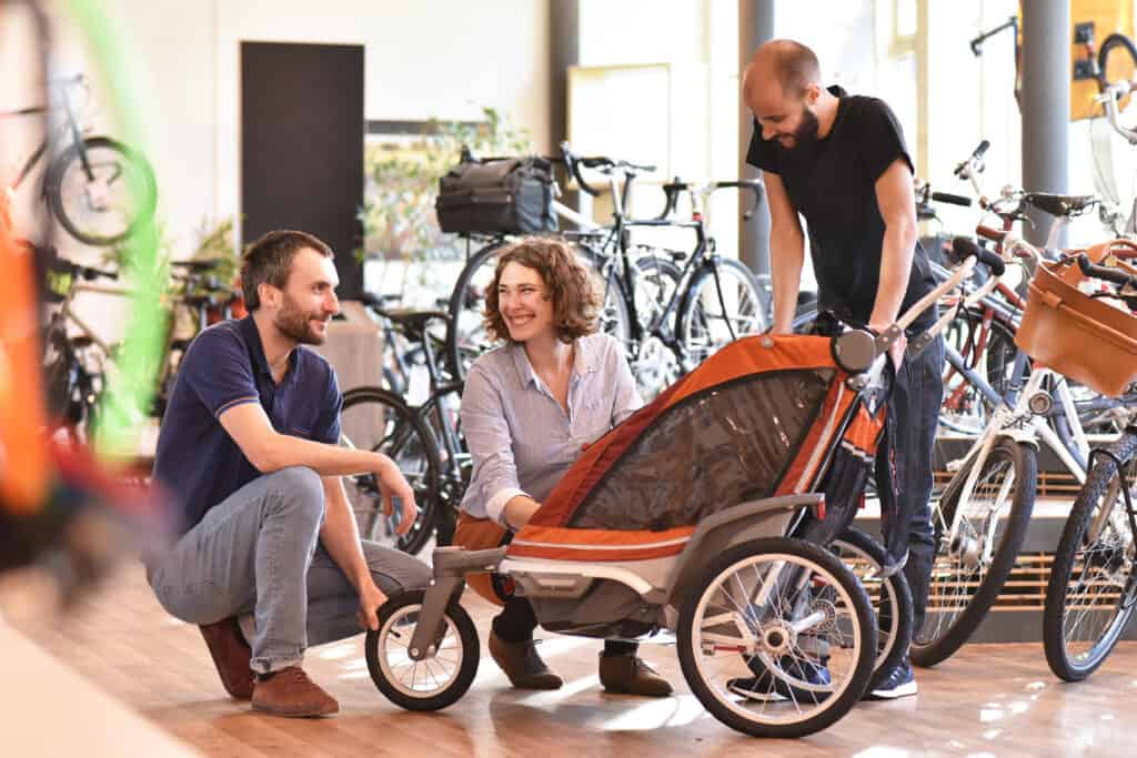 Customer and dealer in bicycle shop