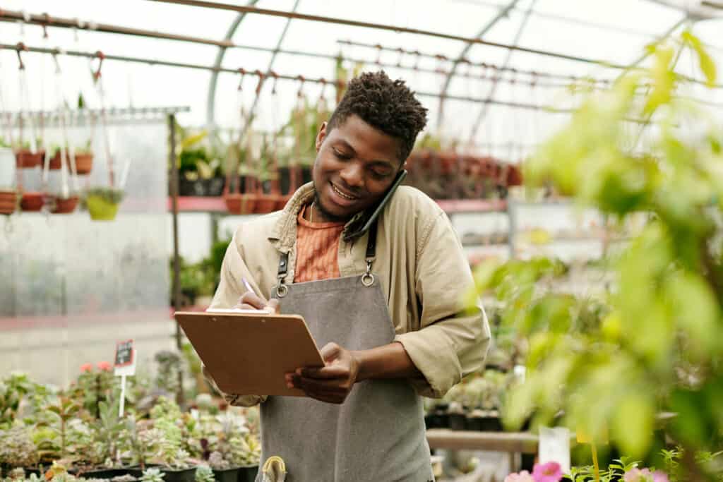 Flower seller completing an end-of-year checklist