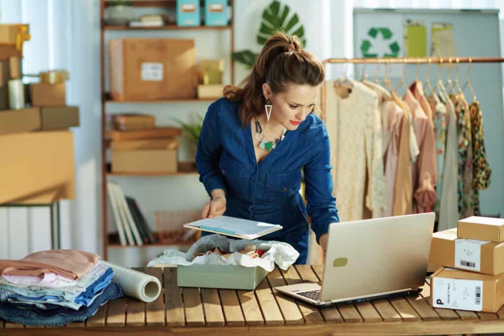 40 years old business owner woman using laptop in office